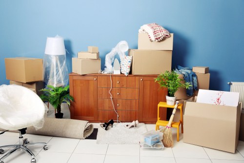 Loading household items into a removals van in Wood Green