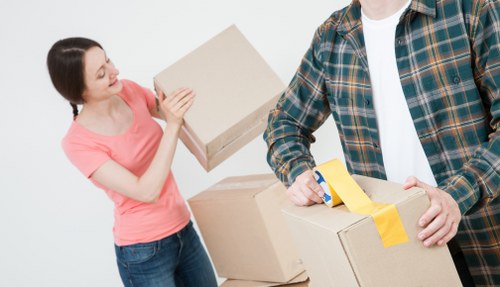 Professional moving van helping with furniture transport in Wood Green