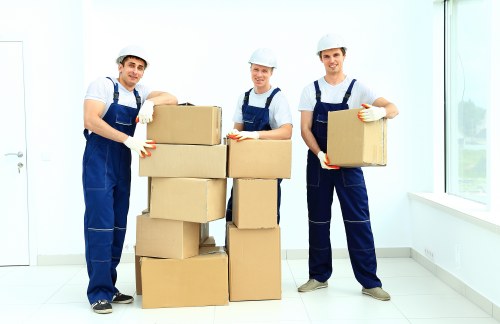 Team member checking access and lifting safety during a move