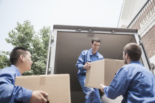 Boxes and furniture prepared for transport by removals van