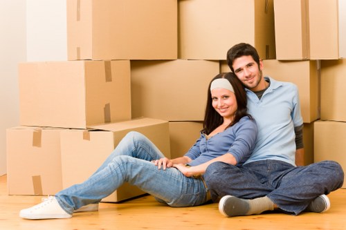 Movers loading household items for a local North London move